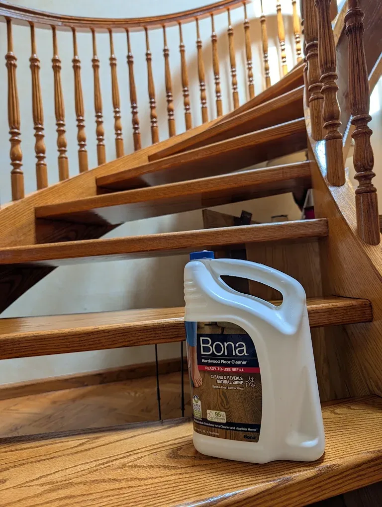 Fine wood care on a polished curved staircase.